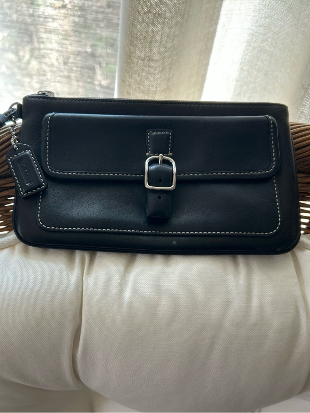 Vintage Coach Black Leather Wristlet with silver hardware.